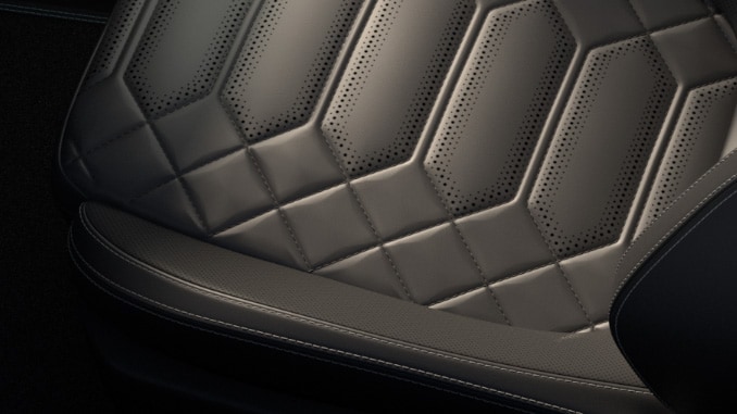 Premium seat in Ebony with full Sensico® and metal grey stitching