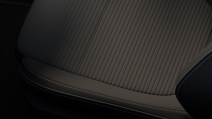 Cloth trim in Black with metal grey stitching