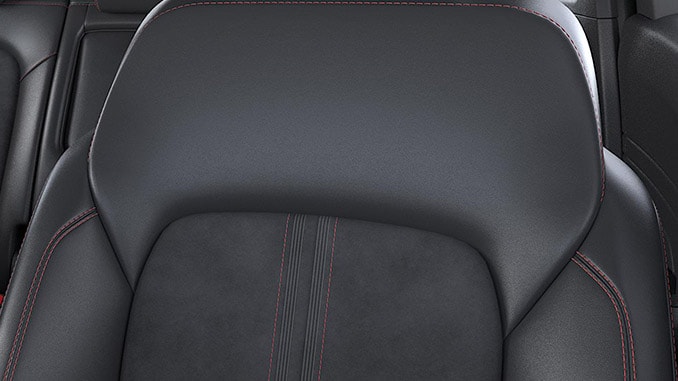 Black, partial premium touch Sensico sports seats with black neosuede inserts and red stitching