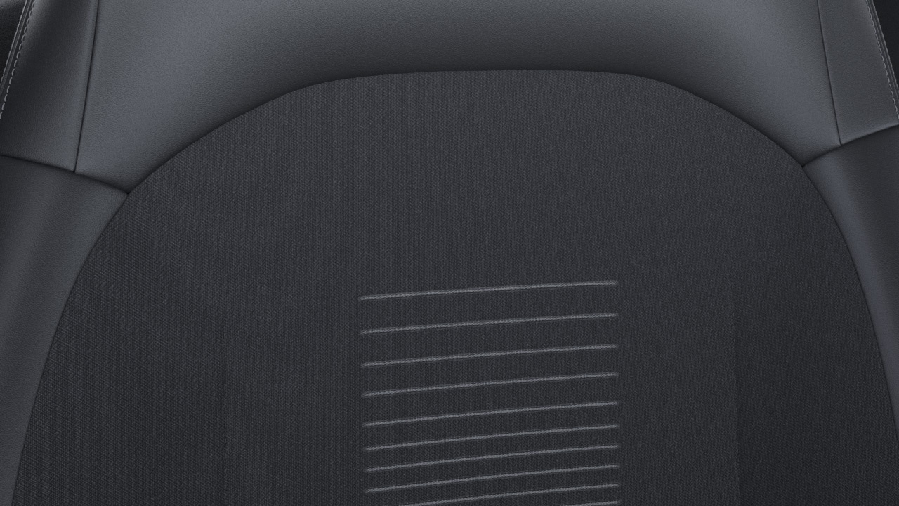 Bekleding i.c.m. Comfort Pack II en/of AGR-stoelen: voorstoelen en achterbank bekleed met gedeeltelijk Sensico bekleding