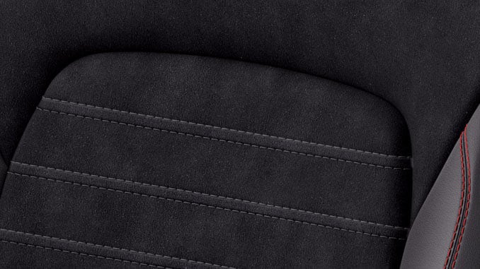 Rapton in black cloth with Partial Sensico seats and red stitching with 10 Way Power Adjust Driver's Seat